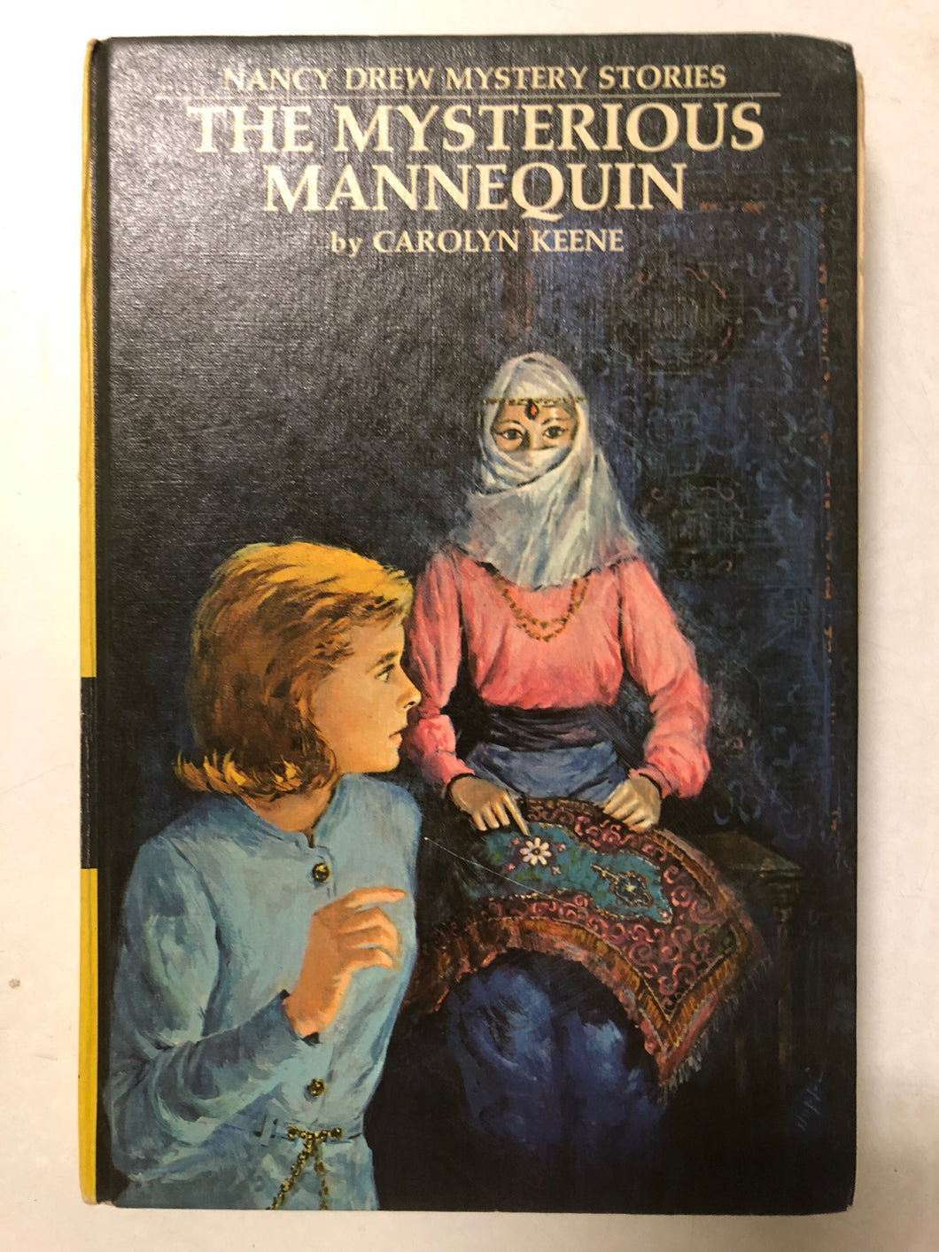 The Mysterious Mannequin - Slick Cat Books 