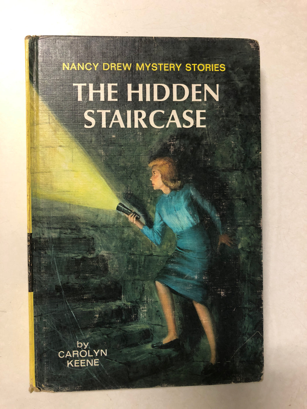 The Hidden Staircase - Slick Cat Books 