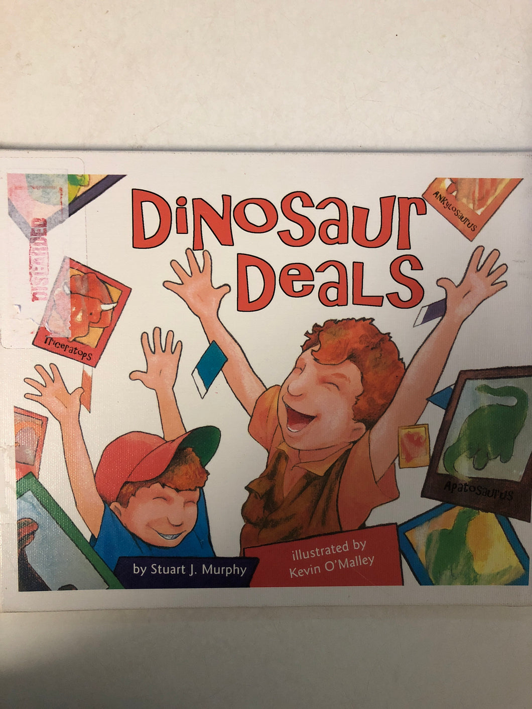 Dinosaur Deals - Slick Cat Books 