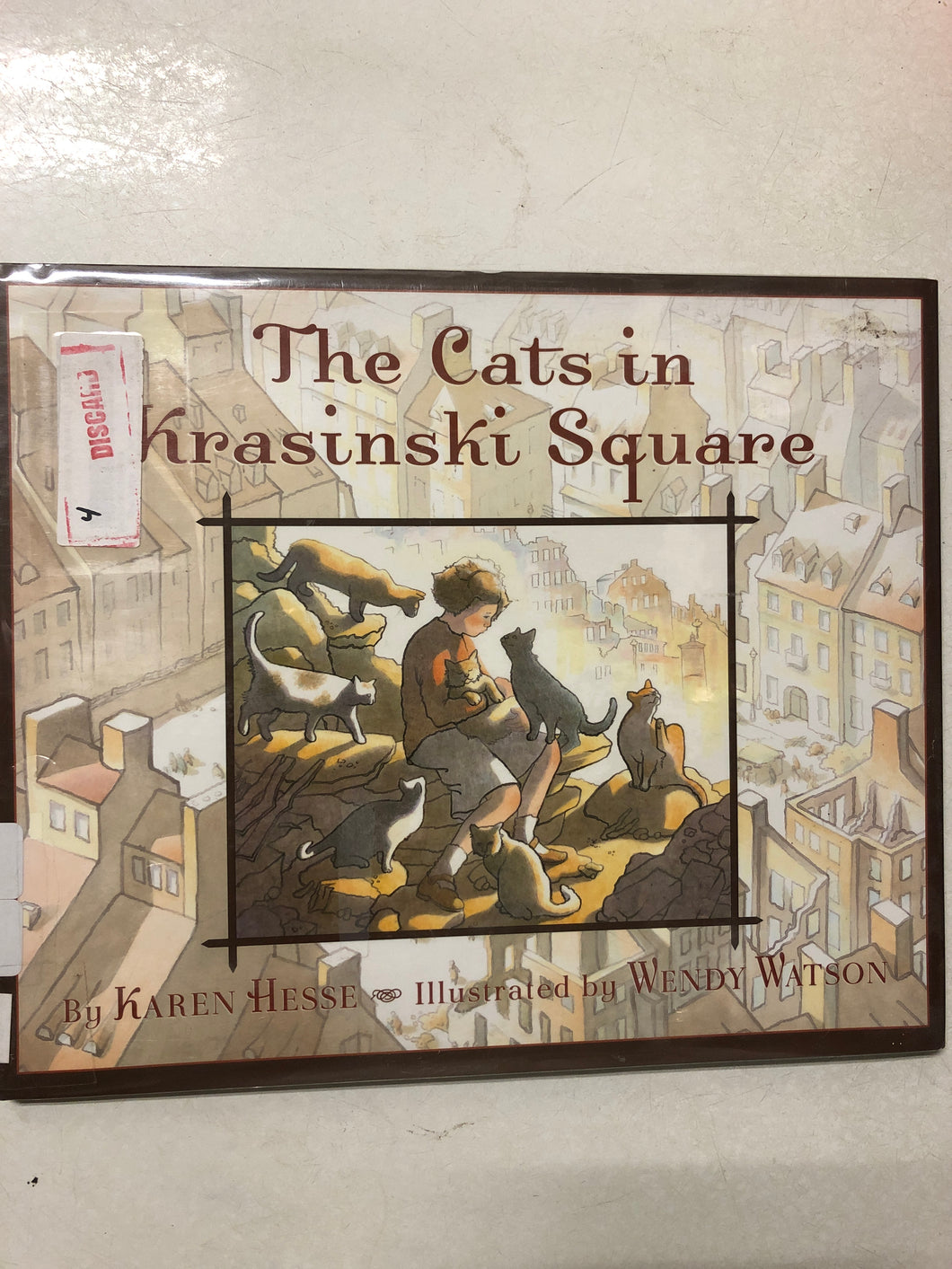 The Cats in Krasinski Square - Slick Cat Books 